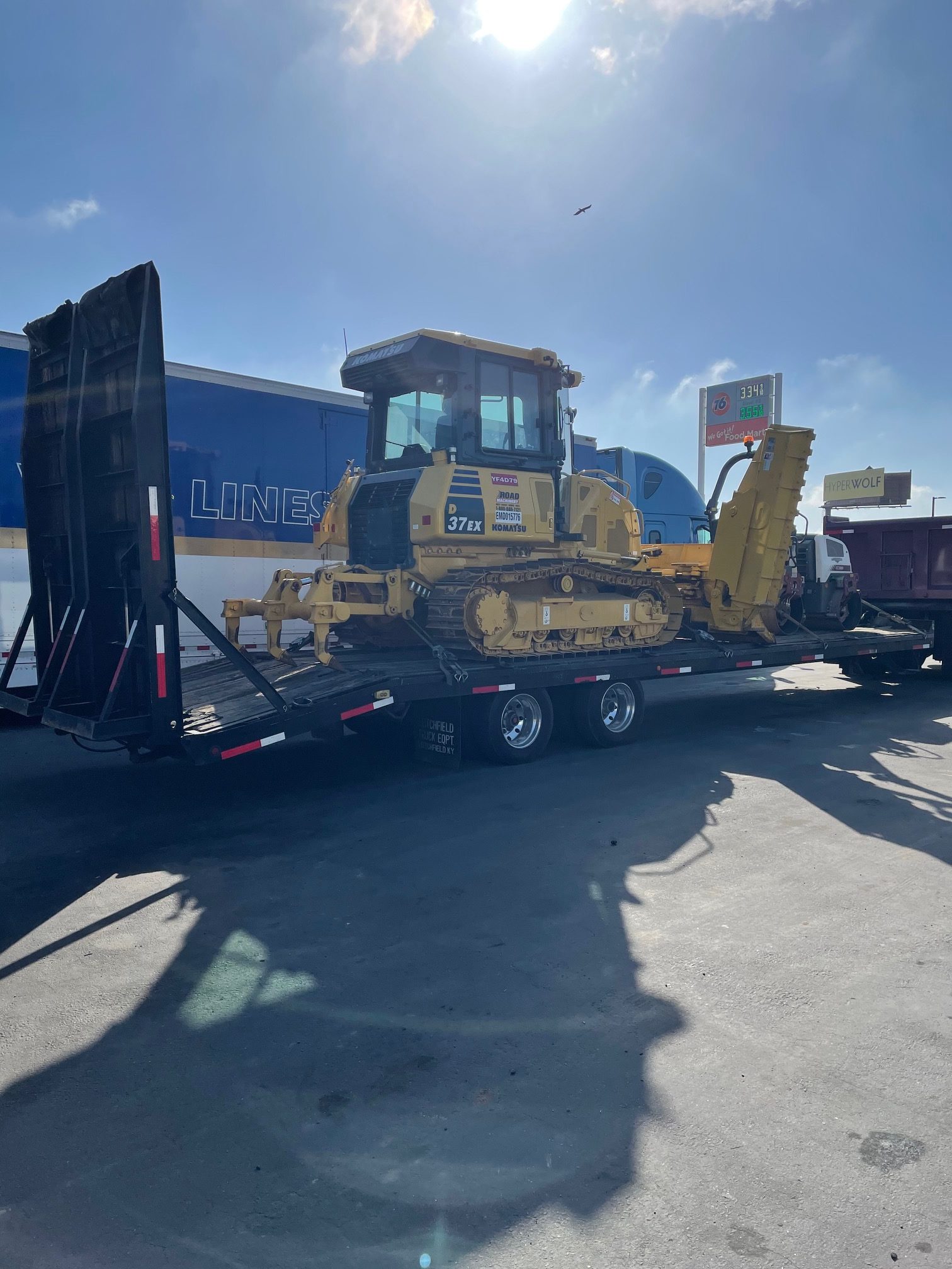 Black Diamond Asphalt heavy equipment paving a commercial parking lot in Southern California